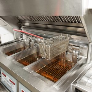Deep fryer with oil on restaurant kitchen